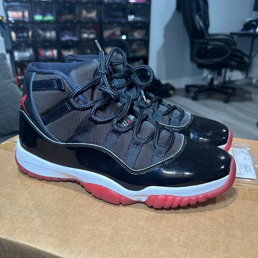 Jordan 11 (Bred) Black and Red High-Top Sneakers